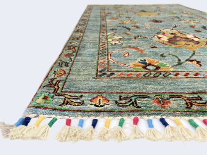 Afghan Khorjin rug by Kirishian Rugs, 2'07"x4'04" in light blue and multicolor, detailed traditional textile design.