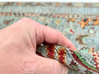 Afghan Khorjin rug by Kirishian Rugs, 2'07" x 4'04", light blue and multicolor, intricate traditional design and craftsmanship.