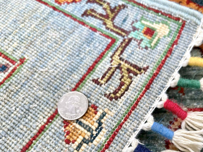 Afghan Khorjin rug by Kirishian Rugs, 2'07" x 4'04", light blue and multicolor with intricate traditional patterns.