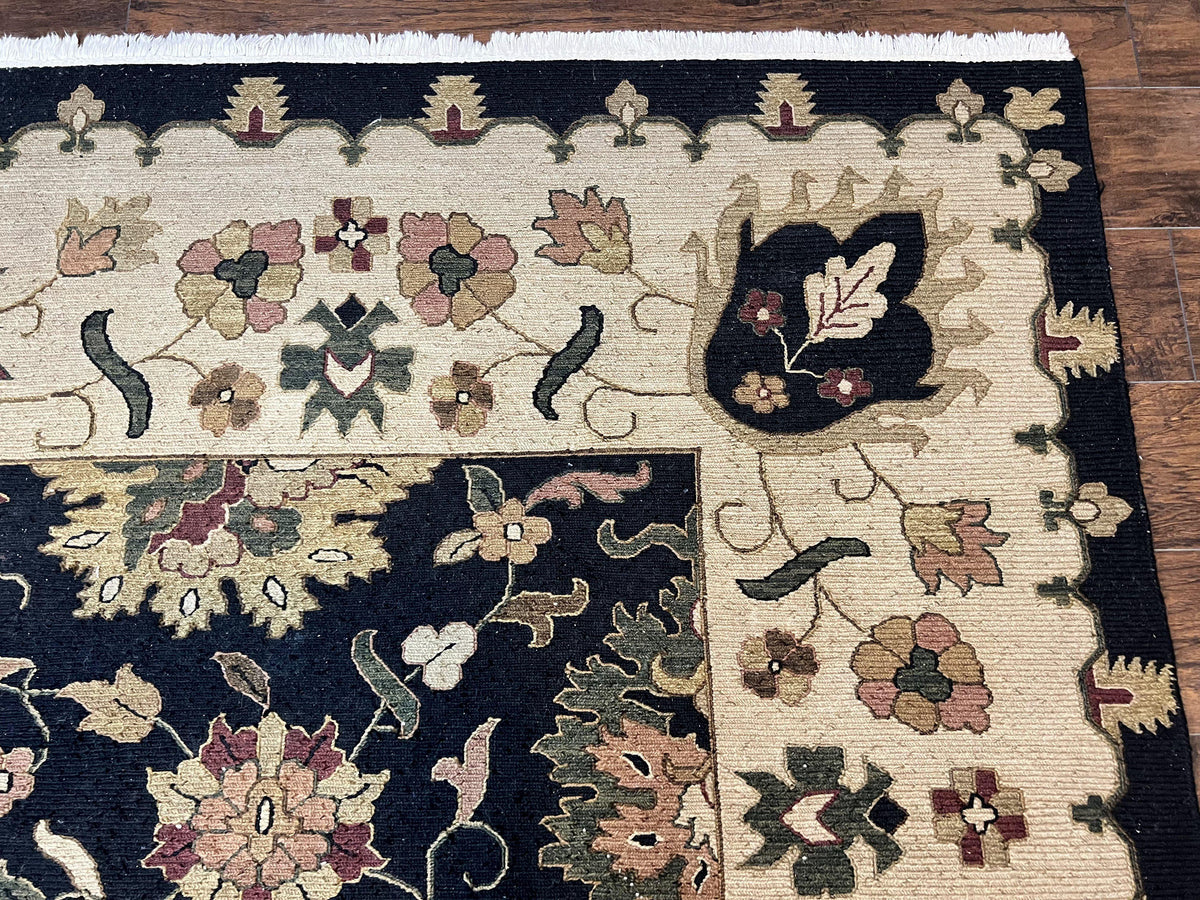 Handmade Indo Persian wool rug, 10x14 floral Oriental carpet in black and beige with intricate traditional Indian Mahal design.