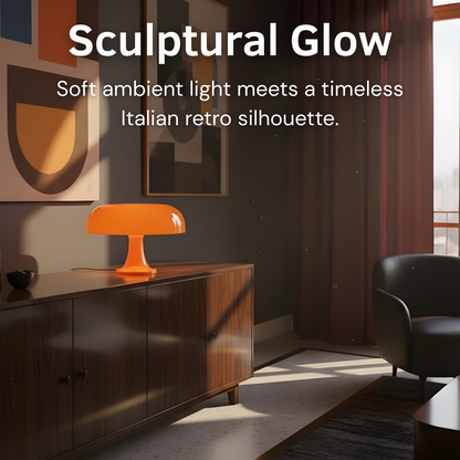 Nuvé Luma Arancio perfume bottle with orange-colored liquid and sleek design, showcasing the Nuvé brand.