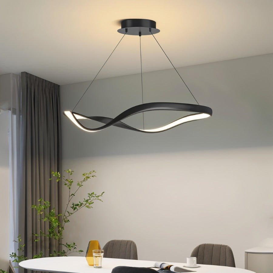Elegant Aaliyah Chandelier by Residence Supply featuring intricate metalwork and multiple hanging crystal accents.