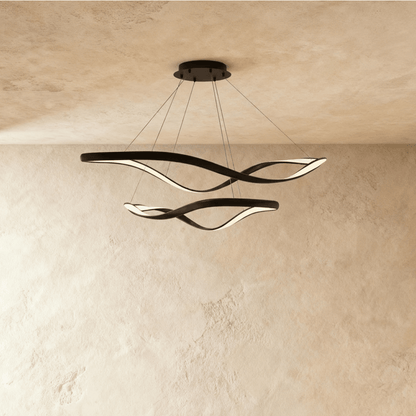 Elegant Aaliyah Chandelier by Residence Supply featuring multiple crystal-like tiers and a polished metallic finish.