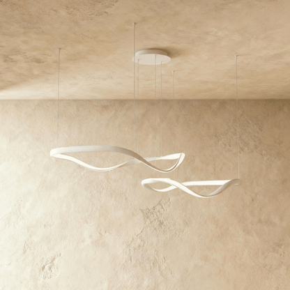 Elegant Aaliyah Chandelier by Residence Supply featuring multiple glass tiers and a modern metallic finish.