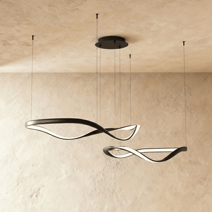Elegant Aaliyah Chandelier by Residence Supply featuring crystal accents and a modern gold finish, hanging from a ceiling.