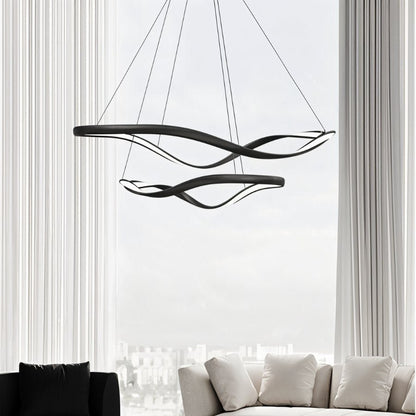 Aaliyah Chandelier by Residence Supply featuring elegant crystal drops and a polished metal frame, hanging from a ceiling.
