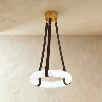 Aktis Alabaster Pendant Light by Residence Supply featuring a sleek alabaster glass shade hanging from a modern fixture.
