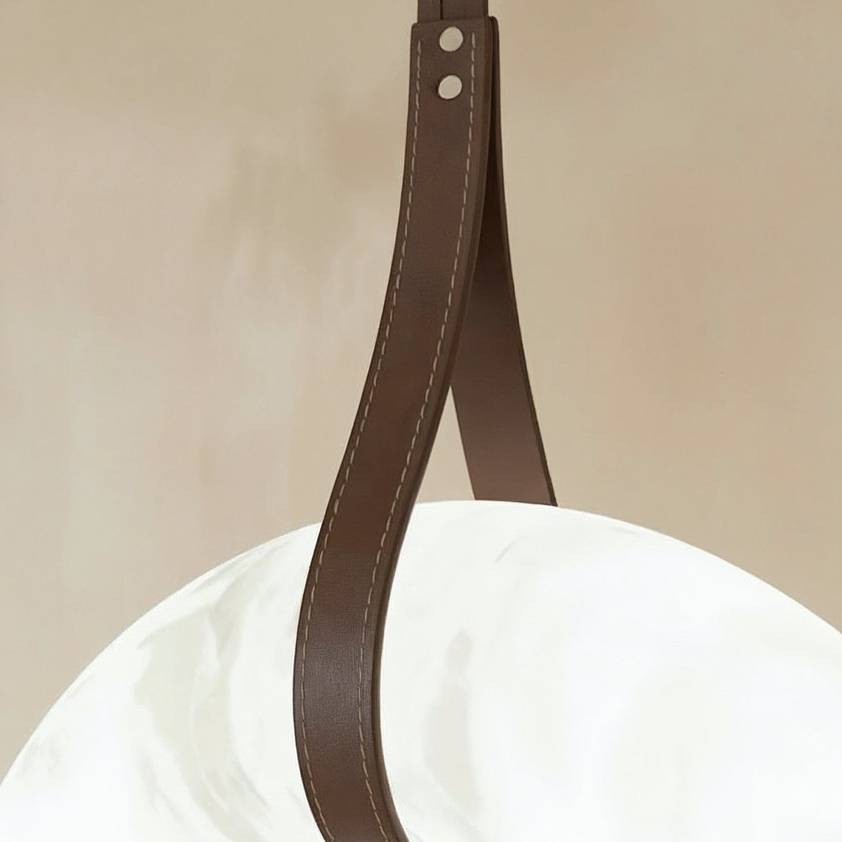 Aktis Alabaster Pendant Light by Residence Supply featuring a smooth alabaster glass shade hanging from a sleek fixture