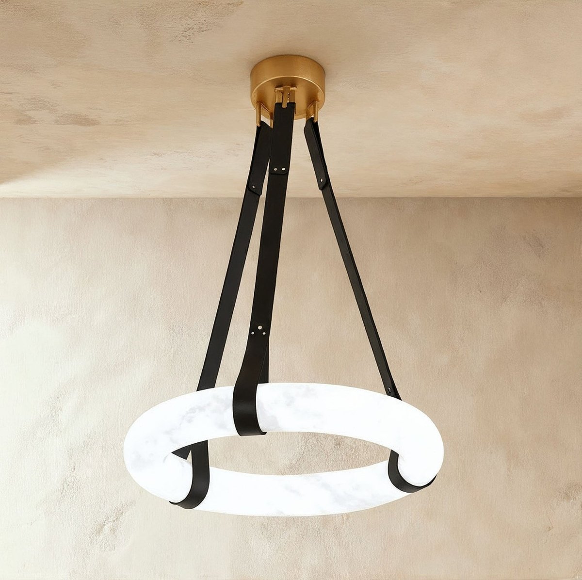 Aktis Alabaster Pendant Light by Residence Supply hanging from ceiling, featuring a smooth alabaster glass shade and modern design.