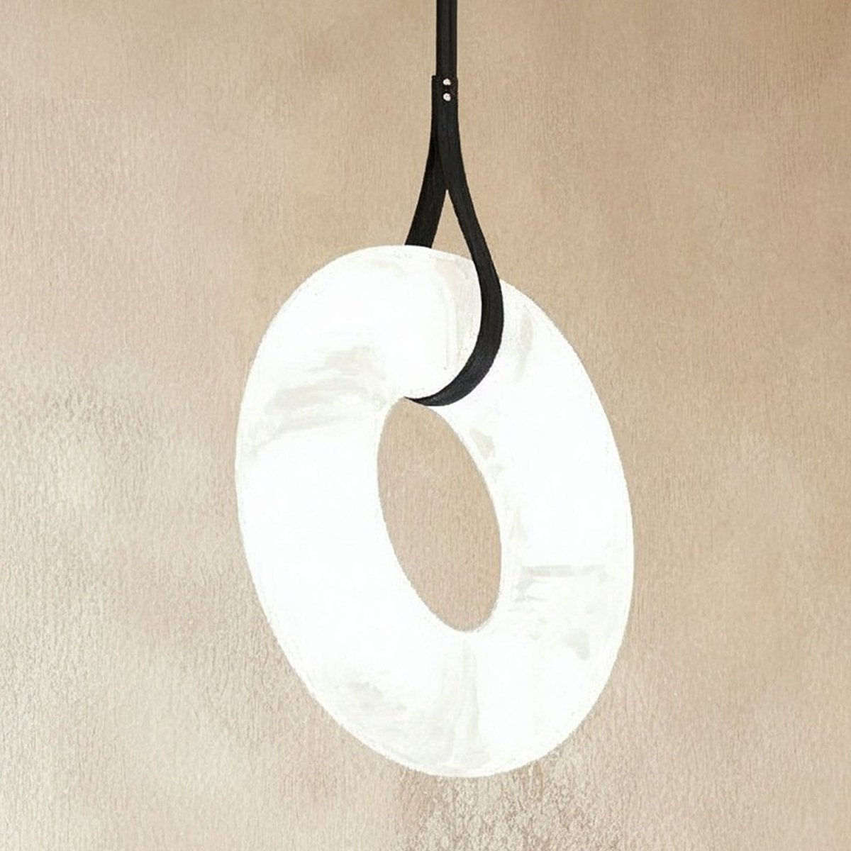 Aktis Alabaster Pendant Light by Residence Supply, featuring a smooth alabaster glass shade hanging from a sleek metal fixture.