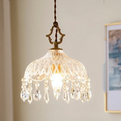 Alshamal glass wall light by Residence Supply, featuring a modern design with clear glass shade and metal fixture for indoor lighting.