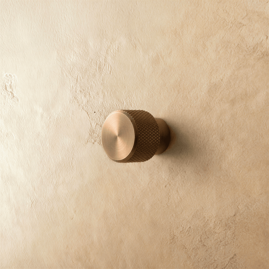Alyma knob and pull bar from Residence Supply, modern cabinet hardware with sleek metal finish, suitable for kitchen and furniture cabinets.
