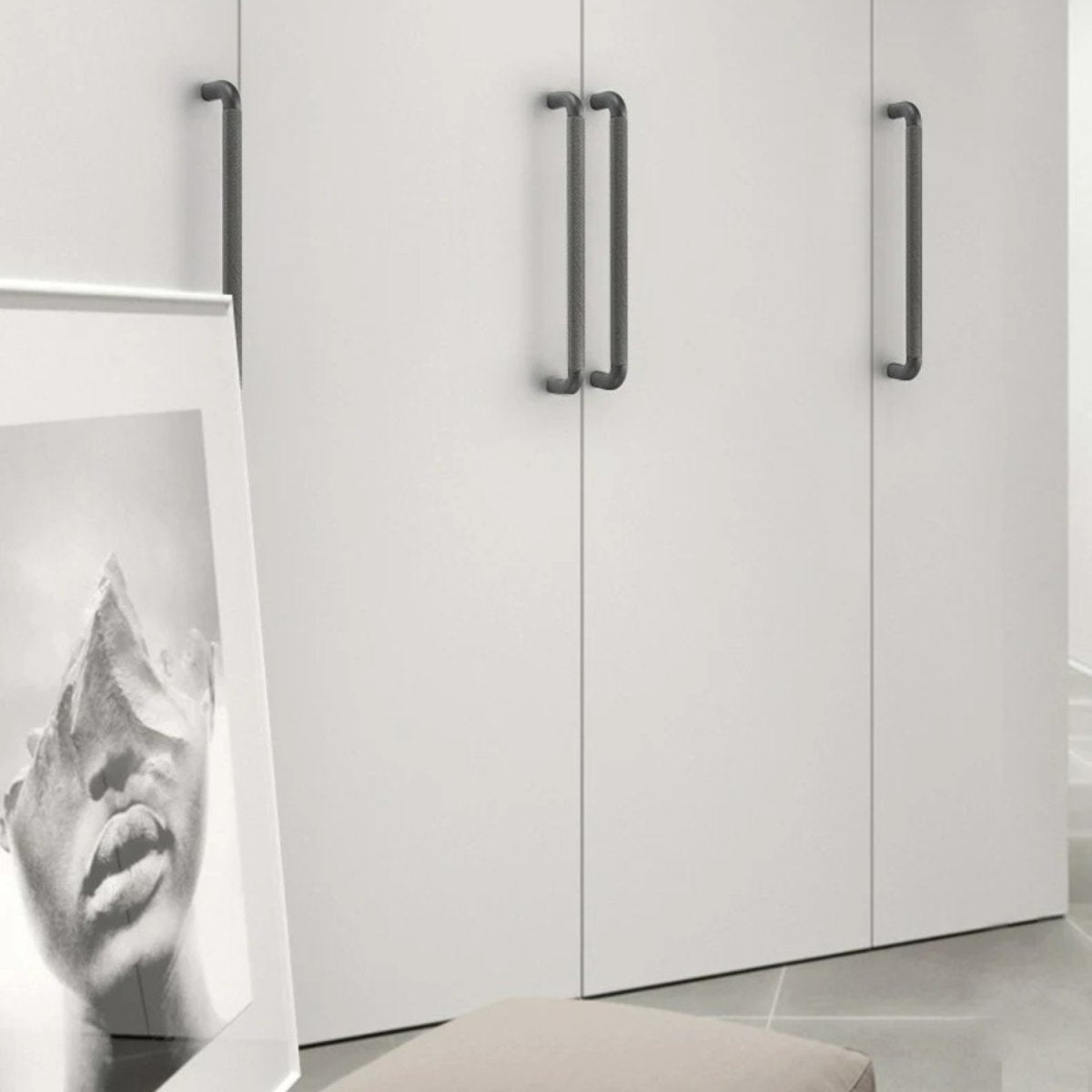 Alyma knob and pull bar in brushed nickel finish, modern cabinet hardware for kitchen or bathroom cabinets.