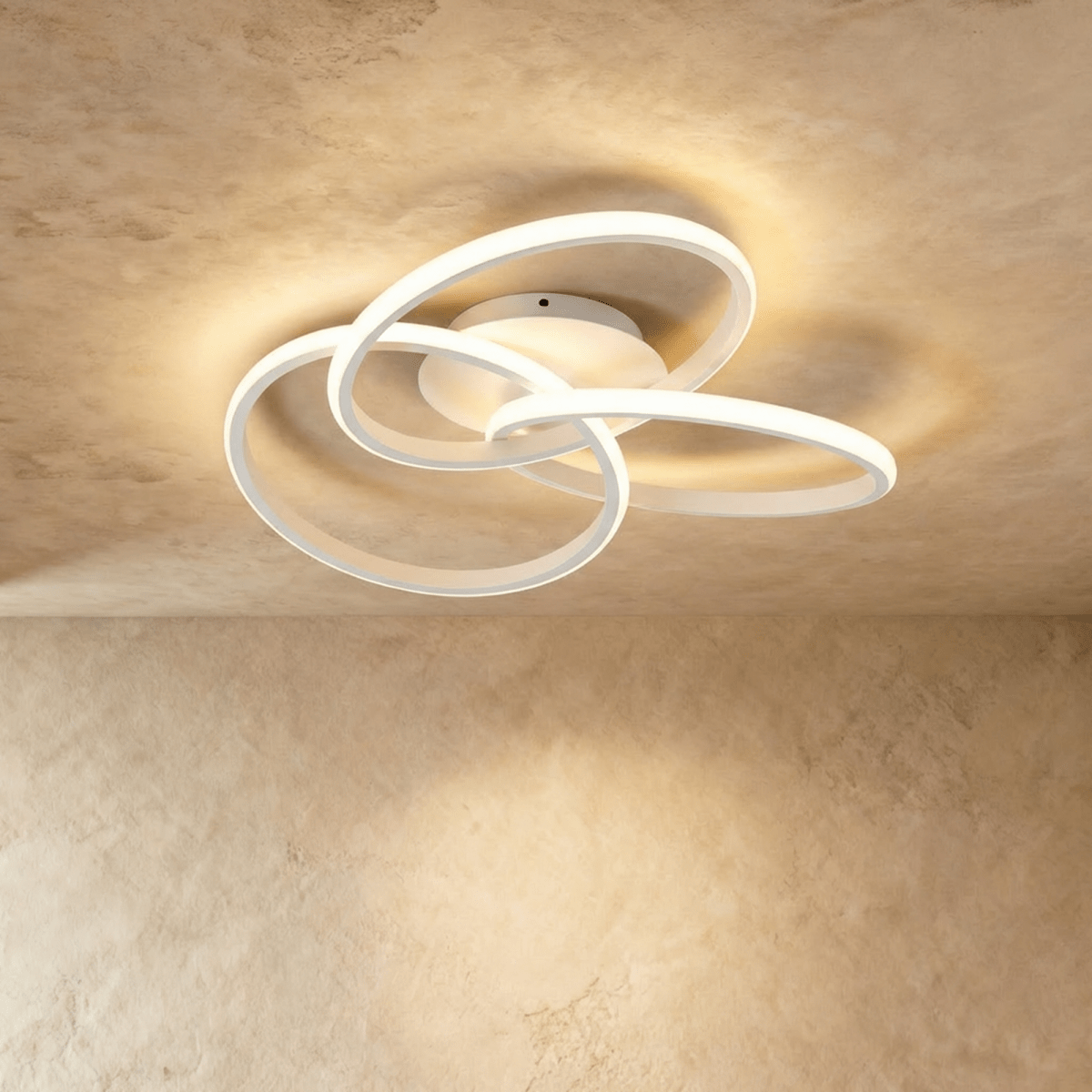 Modern Alyona Ceiling Light by Residence Supply featuring a sleek, circular design with warm LED illumination.