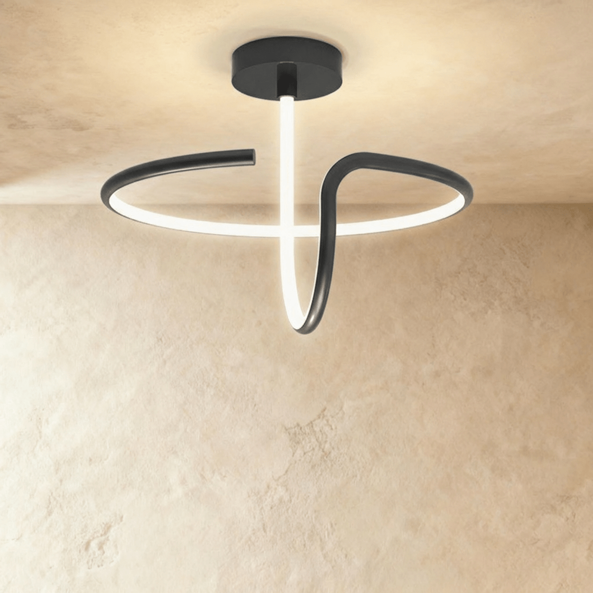Alyona ceiling light by Residence Supply featuring a modern design with a sleek metal finish and ambient lighting.