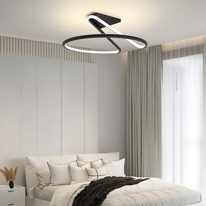 Alyona ceiling light fixture by Residence Supply with a modern design and glass shade, mounted on a ceiling.