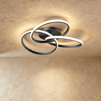 Alyona ceiling light fixture by Residence Supply featuring a modern design with a sleek metal finish and glass shades.