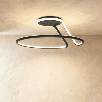 Alyona ceiling light from Residence Supply featuring a modern design with a sleek metal finish and multiple light bulbs.