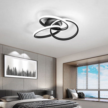 Alyona ceiling light by Residence Supply featuring a modern design with glass and metal elements, mounted on a ceiling.