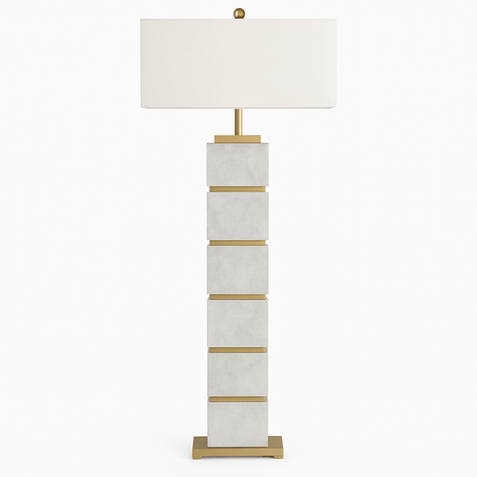 Amira Floor Lamp by Residence Supply featuring a sleek modern design with a tall stand and fabric shade in a contemporary living space.