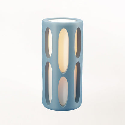Terra Labs Amoeba Table Lamp with organic, flowing design and frosted glass shade on a sleek base.