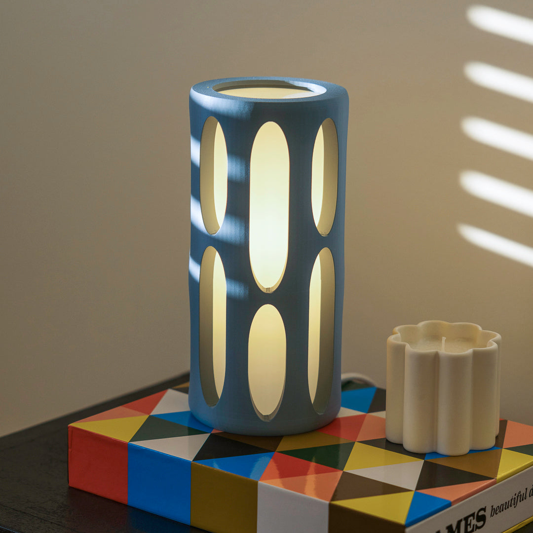 Terra Labs Amoeba Table Lamp with organic, amoeba-shaped design and soft glowing light, ideal for modern home decor.