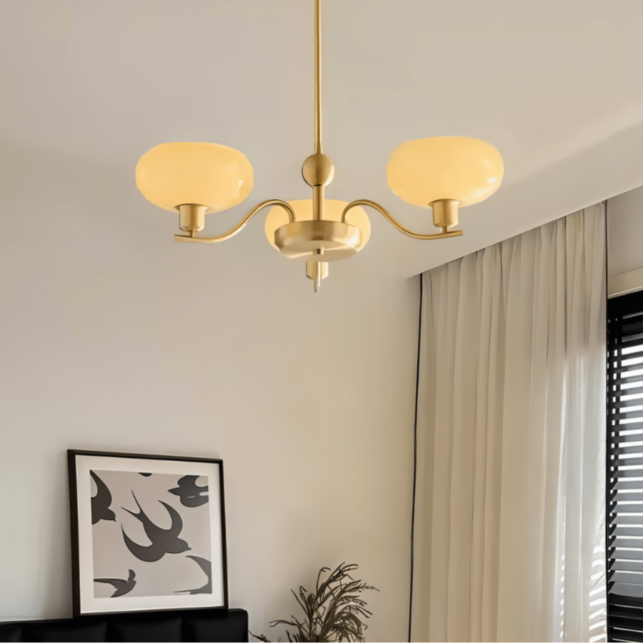 Ampix chandelier by Residence Supply featuring multiple glass pendant lights with a modern metallic frame.