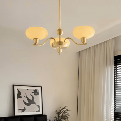 Ampix chandelier by Residence Supply featuring multiple glass pendant lights with a modern metallic frame.