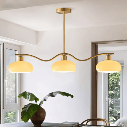 Ampix chandelier by Residence Supply featuring multiple glass shades and intricate metal frame for elegant lighting decor