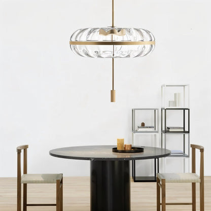 Sculptural glass Anala Pendant Light by Residence Supply hanging over a dining area, showcasing its artistic design.