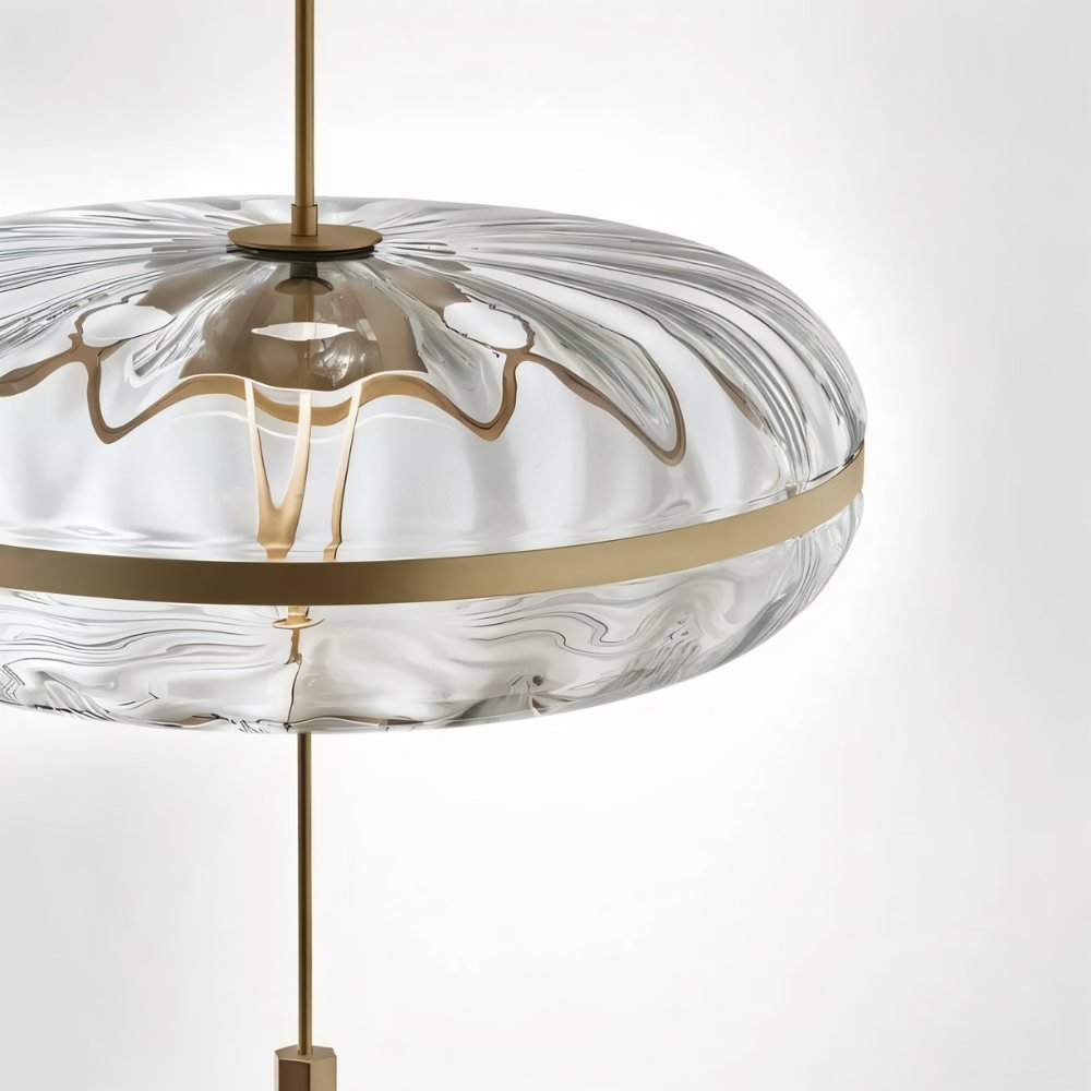 Sculptural glass Anala Pendant Light by Residence Supply hanging with textured glass shade and modern design.