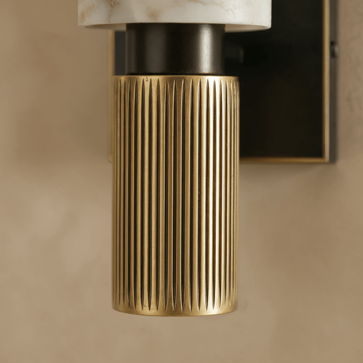 Ansu Alabaster Wall Lamp by Residence Supply featuring a sleek alabaster glass shade and modern wall mounting design.