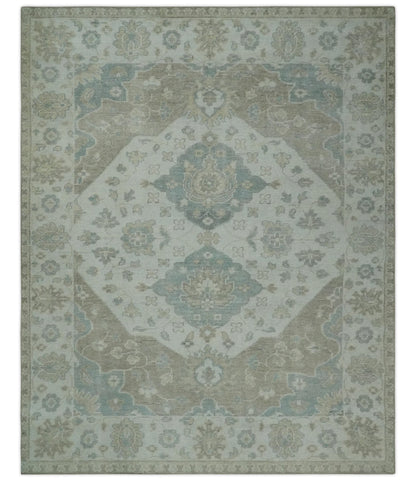 Antique-style medallion wool area rug in earthy ivory and camel colors, 8x10 size, by The Rug Decor.