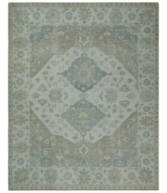 Antique-style medallion wool area rug in earthy ivory and camel colors, 8x10 size, by The Rug Decor.