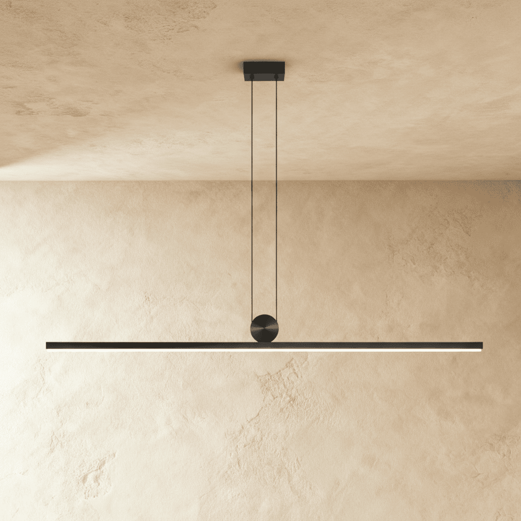 Modern Arlo pendant light by Residence Supply with a sleek metal finish and adjustable hanging cord, ideal for contemporary interiors.