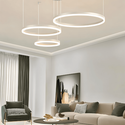 Elegant Aryana Chandelier by Residence Supply featuring multiple hanging glass pendant lights and a sleek modern design.