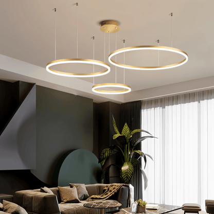 Elegant Aryana chandelier by Residence Supply featuring intricate metalwork and multiple hanging glass orbs.