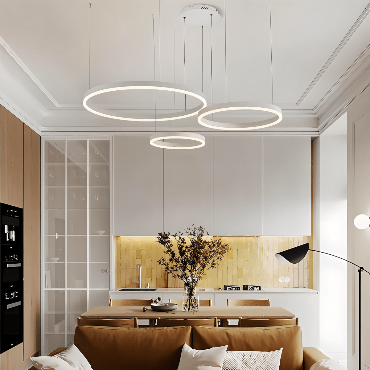Elegant Aryana Chandelier with intricate metal design and multiple glass light fixtures, hanging from a ceiling.