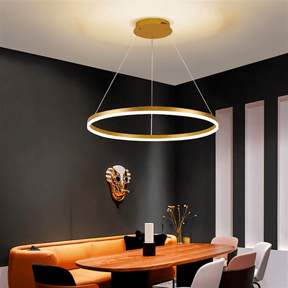 Elegant Aryana Chandelier with multiple glass pendant lights and intricate metal frame, hanging from a ceiling.