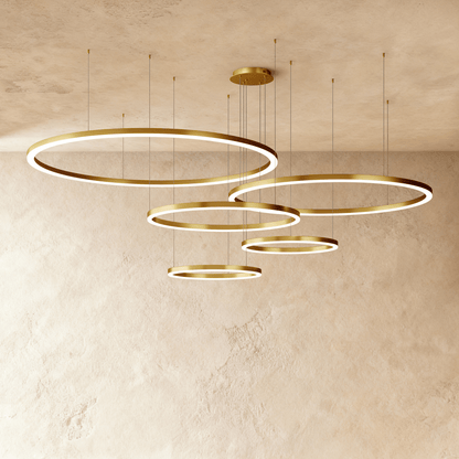 Elegant Aryana Chandelier by Residence Supply featuring multiple glass pendant lights and a sleek metal frame.