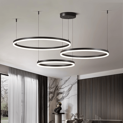 Elegant Aryana Chandelier by Residence Supply featuring multiple hanging glass orbs and a sleek metal frame.