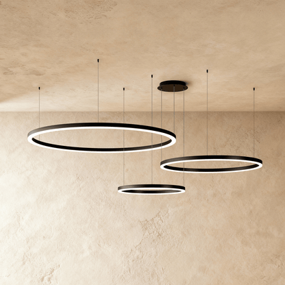 Elegant Aryana Chandelier by Residence Supply featuring crystal accents and a modern gold finish, hanging with multiple light bulbs.