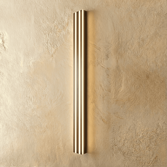 Modern Ashil Wall Lamp by Residence Supply featuring sleek design and adjustable arm for ambient lighting.