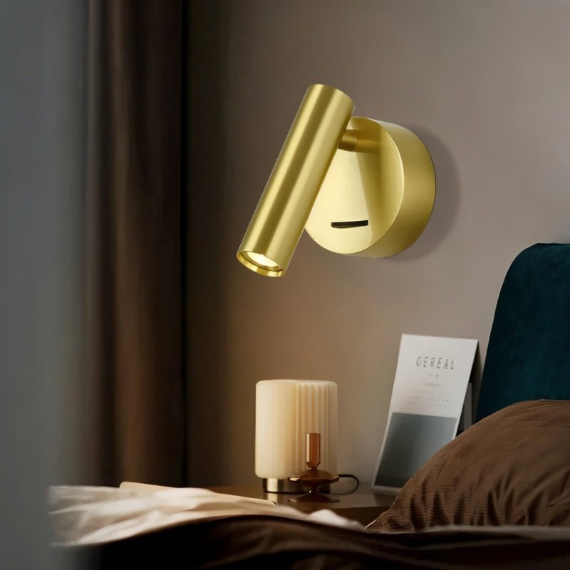 Brass bedside reading lamp from Residence Supply with adjustable arm and modern design for bedroom lighting.