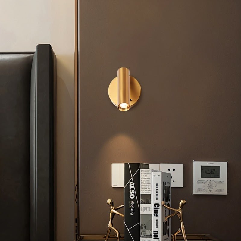 Brass bedside reading lamp from Residence Supply with adjustable arm and modern design for bedroom lighting.