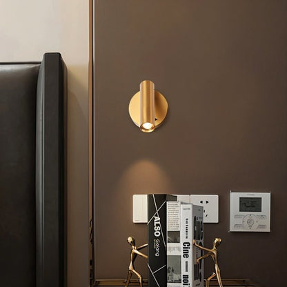 Brass bedside reading lamp from Residence Supply with adjustable arm and modern design for bedroom lighting.