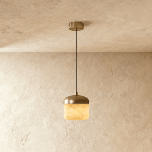 Asta Alabaster Pendant Light by Residence Supply featuring a smooth alabaster glass shade hanging from a sleek fixture.