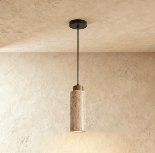 Aveno pendant light by Residence Supply hanging from ceiling, featuring a sleek modern design with a metal shade.