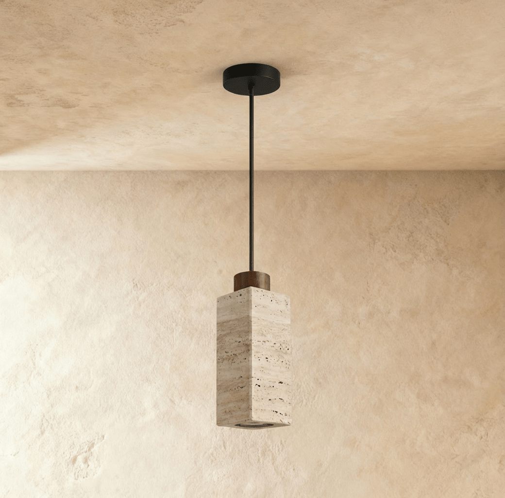 Aveno Pendant Light by Residence Supply hanging from ceiling with a sleek modern design and warm lighting in a contemporary interior