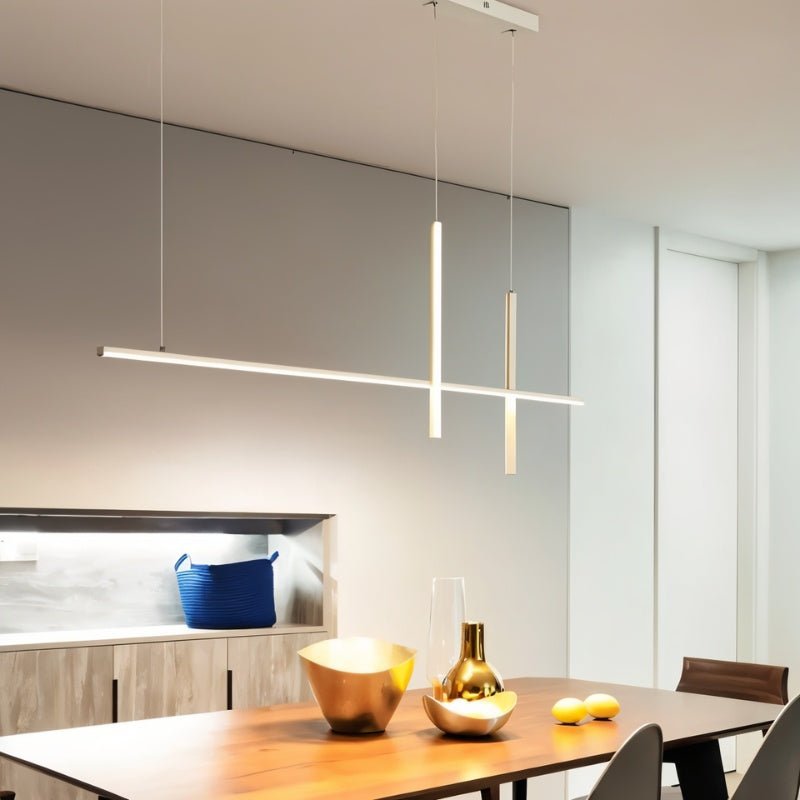 Avery Pendant Light by Residence Supply hanging from ceiling with a sleek modern design and warm light fixture.
